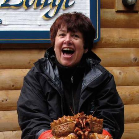 Judy Faucett holding a crab.
