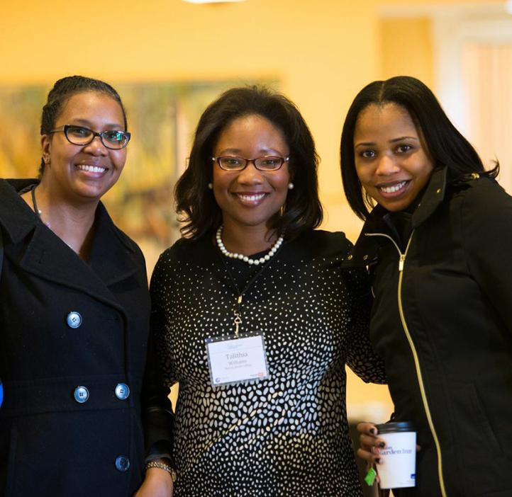 Talithia Williams with colleagues
