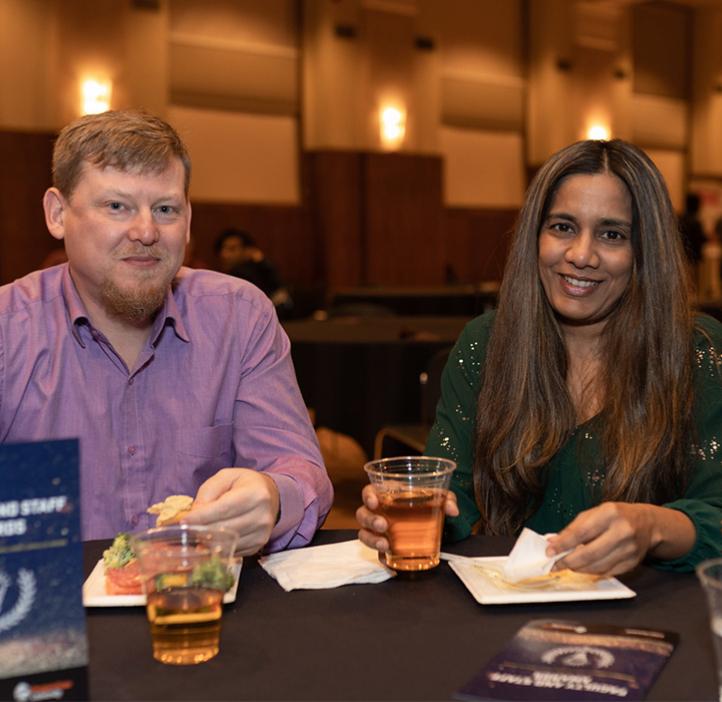 Vrushali Bokil with Nathan Gibson at table